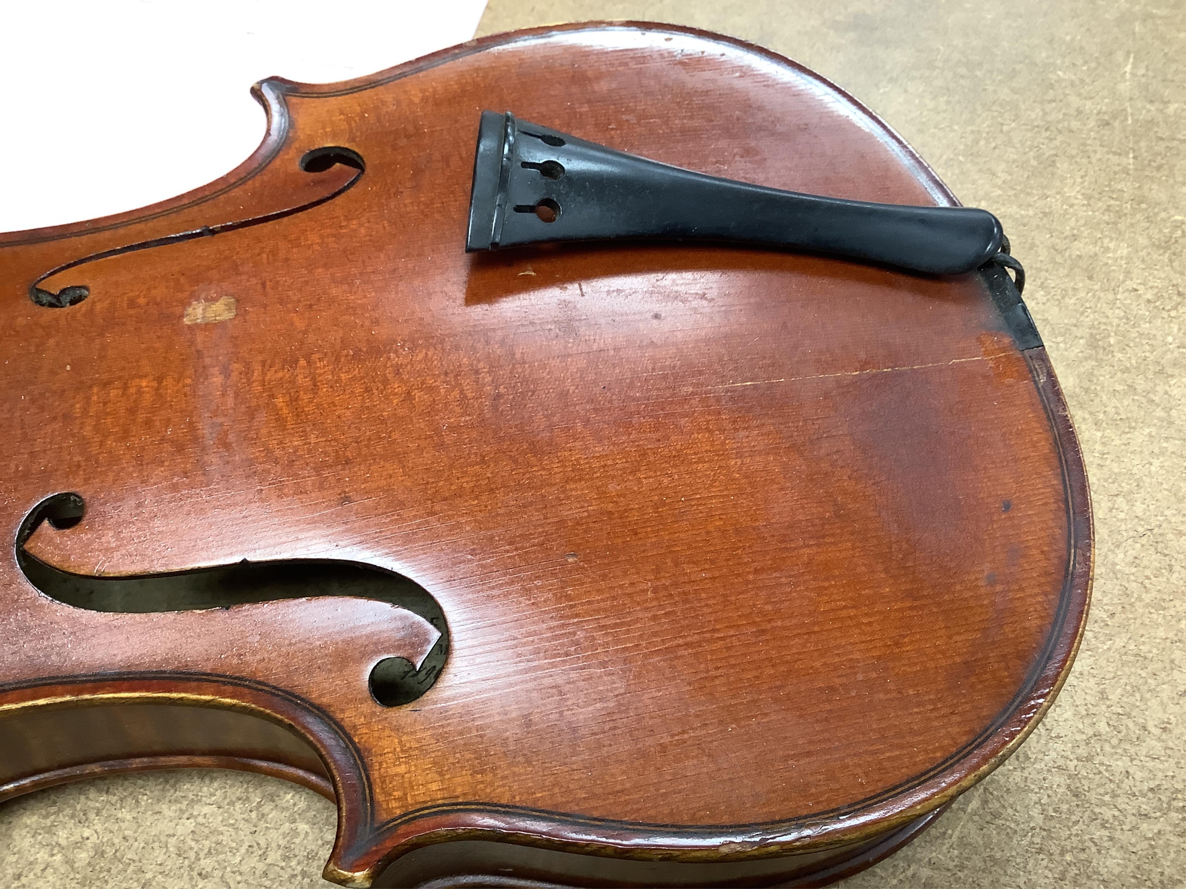 A late 19th century French Chipot-Vuillaume violin, with Edward Withers case, back measures 36cm.